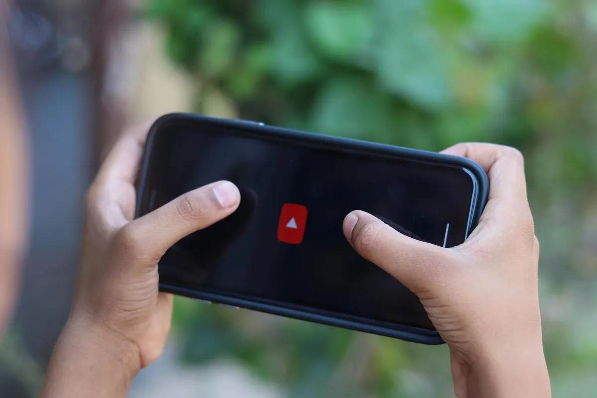 A smartphone showing video content