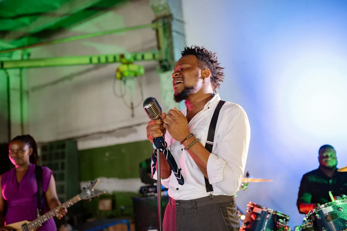 An African musician performing on stage